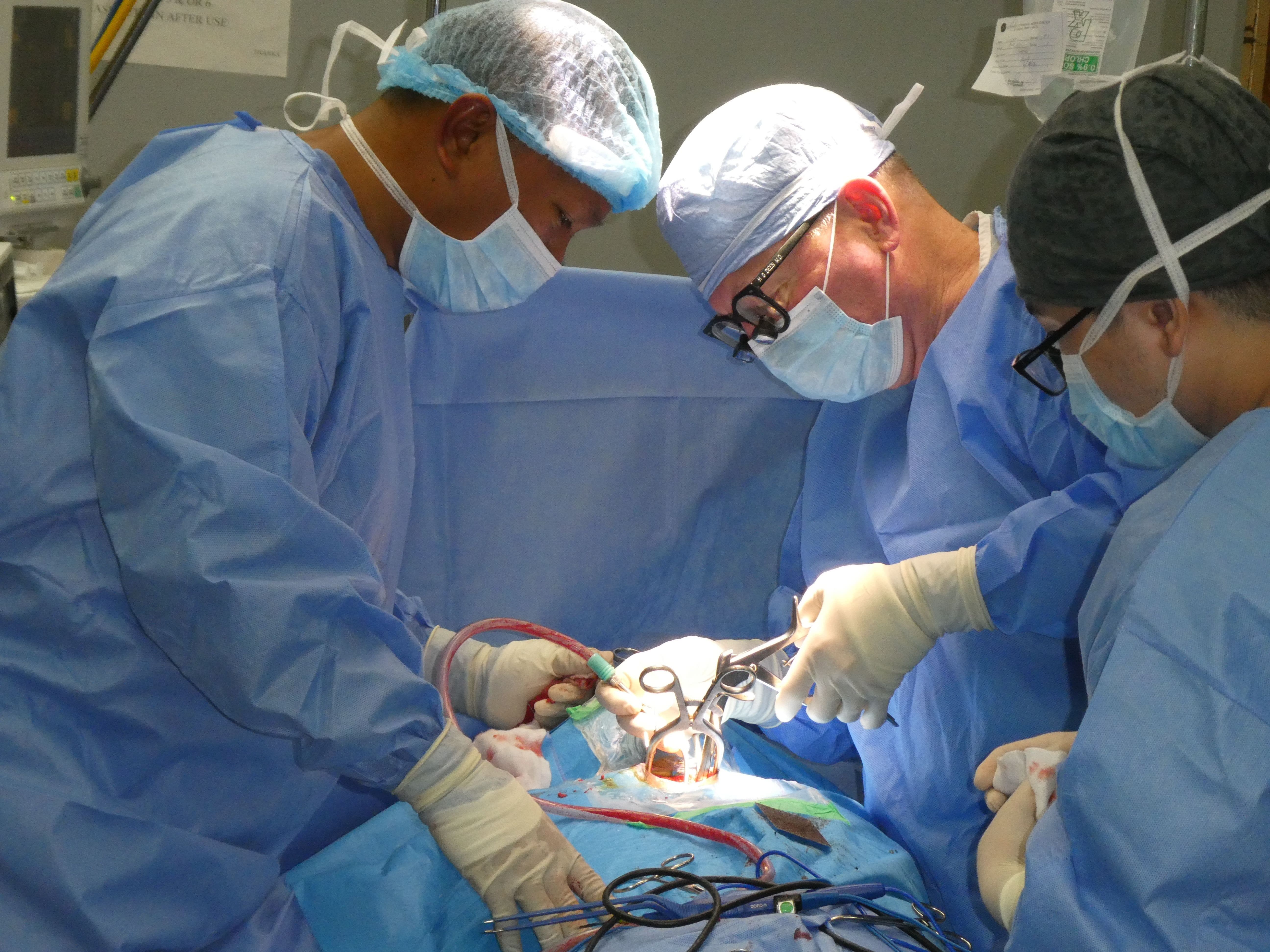 Doctors and a Nurse in Surgery